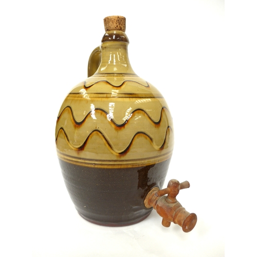 7157 - A Winchcombe Pottery flagon probably by Ray Finch with ochre glaze and painted wave line detail. Imp... 