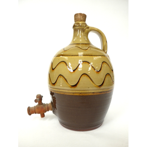 7157 - A Winchcombe Pottery flagon probably by Ray Finch with ochre glaze and painted wave line detail. Imp... 