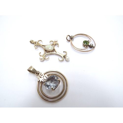 6154 - Two 9ct gold pendants, one with opal and seed pearls the other seed pearl and peridot and another st... 