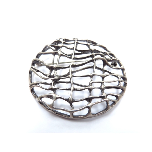 6414 - A Uni David Andersen sterling silver modernistic brooch/pendant, 5.8cm diameter, 21.9g