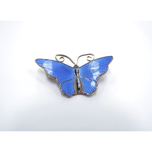 6407 - A David Andersen blue enamel butterfly brooch, stamped Norway 925s, 4.5cm wide