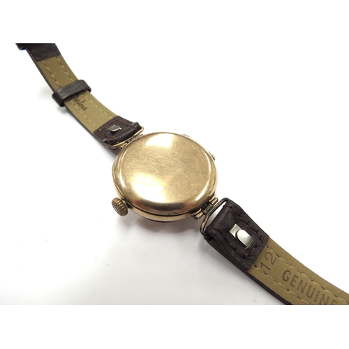 6340 - A 9ct gold cased Dennison wristwatch with leather strap, 22.3g total