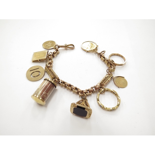 6163 - A 9ct gold chain charm bracelet hung with a 1908 gold half sovereign, 18ct gold eternity ring, 9ct g... 