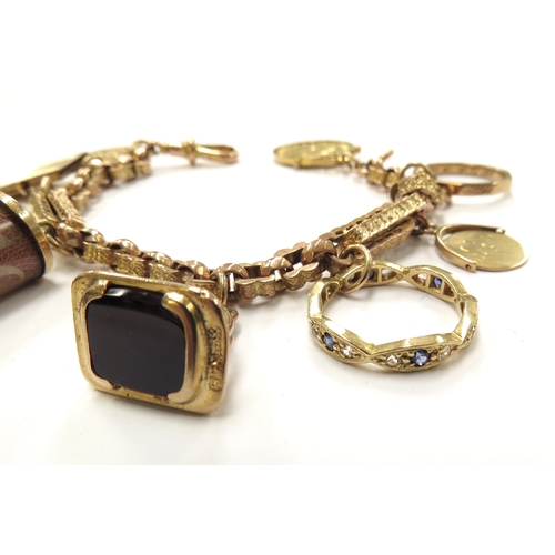 6163 - A 9ct gold chain charm bracelet hung with a 1908 gold half sovereign, 18ct gold eternity ring, 9ct g... 