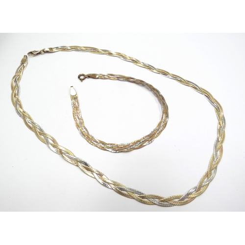 6370 - A 9ct gold three tone woven necklace, 41cm long and a similar bracelet, 18.5cm long, 10.5g