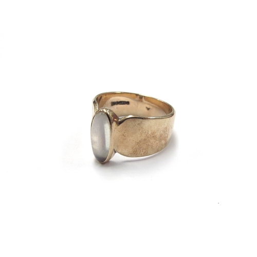 6296 - A 9ct gold ring with oval moonstone cabochon. Size N, 4.6g