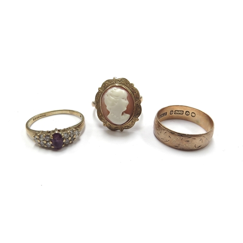 6375 - A 9ct gold cameo ring, size J, 9ct gold paste set ring, size J and a 9ct gold band, size L with engr... 