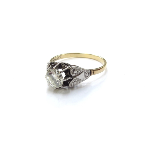 6125 - An 18ct gold platinum set diamond solitaire ring, 0.70ct approx. Size O/P, 2.4g