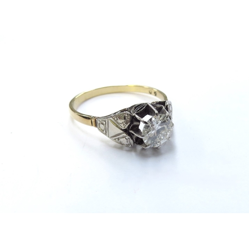 6125 - An 18ct gold platinum set diamond solitaire ring, 0.70ct approx. Size O/P, 2.4g