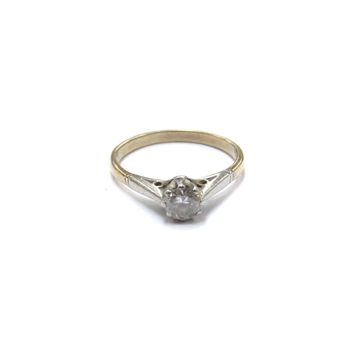 6213 - A diamond solitaire ring 0.25ct approx, shank stamped 18ct. Size O, 2.3g