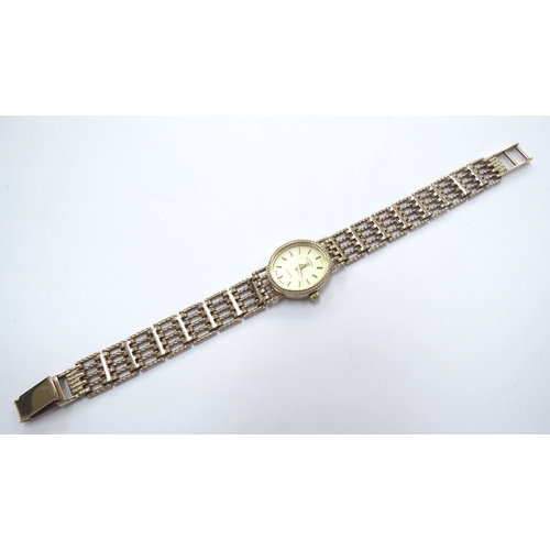 6103 - A 9ct gold Rotary wristwatch with 9ct gold strap, 14g total