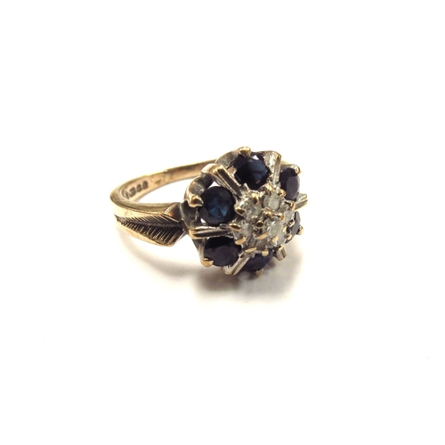 6099 - A 9ct gold sapphire and diamond cluster ring. Size M, 3.8g