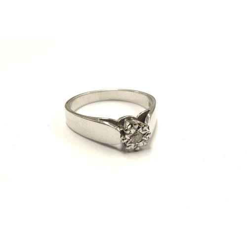 6102 - An 18ct white gold ring set with a 0.04ct diamond. Size P/Q, 4.6g