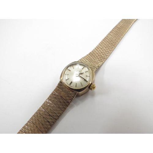 6339 - An Omega 9ct gold wristwatch, 28.9g total