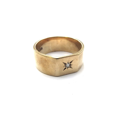 6165 - A 9ct gold signet ring set with a small diamond chip. Size R/S, 7.5g