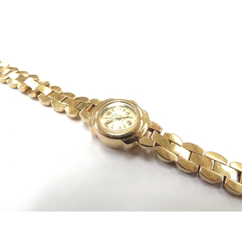 6357 - An 18ct gold D.Vine lady's wristwatch with 18ct gold strap, 22.3g