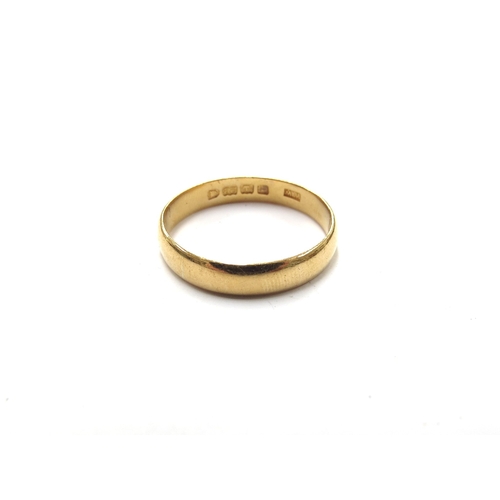 6374 - A 22ct gold wedding band. Size R/S, 3.6g