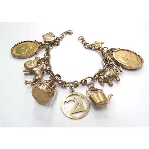 6147 - A 9ct gold charm bracelet with 9ct gold charms and two gold sovereigns 1908 and 1911, 36g total