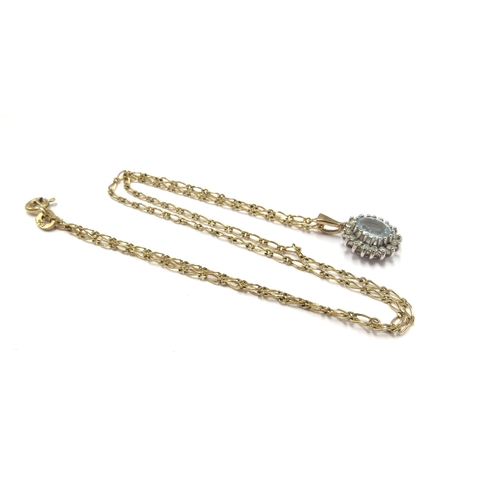 6158 - An aquamarine and diamond cluster pendant hung on a 9ct gold chain, 40cm long, 2.9g