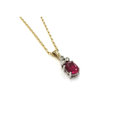 6107 - A ruby and diamond pendant hung on a 9ct gold chain, 45cm long, 3.6g