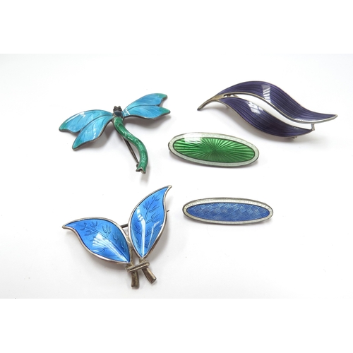 6409 - A David Andersen silver blue enamel double leaf brooch, three JA&S enamel brooches including dragonf... 