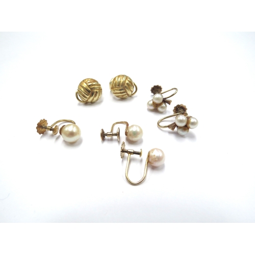 6373 - A pair of gold clip-on earrings stamped 14k, 7.4g and two pairs of 9ct gold screwback pearl earrings... 