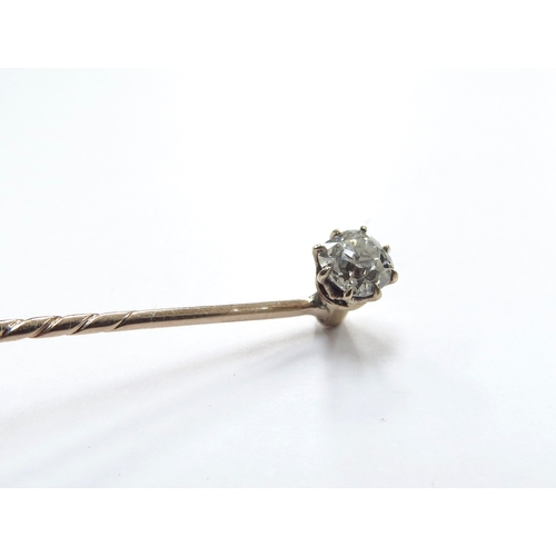 6129 - A diamond set stick pin with screw back, 0.50ct approx