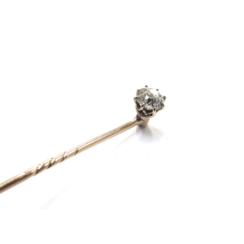 6129 - A diamond set stick pin with screw back, 0.50ct approx