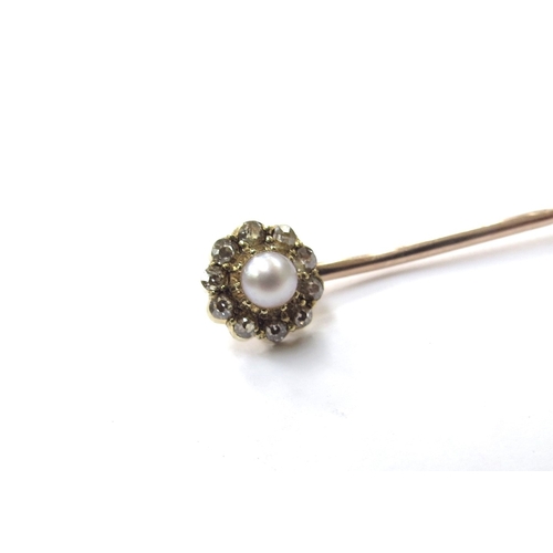 6130 - A diamond and single pearl cluster stick pin