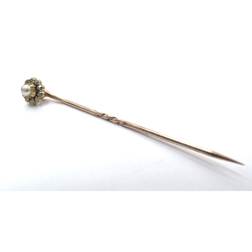 6130 - A diamond and single pearl cluster stick pin