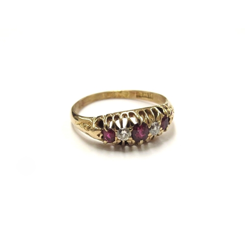 6388 - An 18ct gold ruby and diamond ring. size N/O, 2.7g