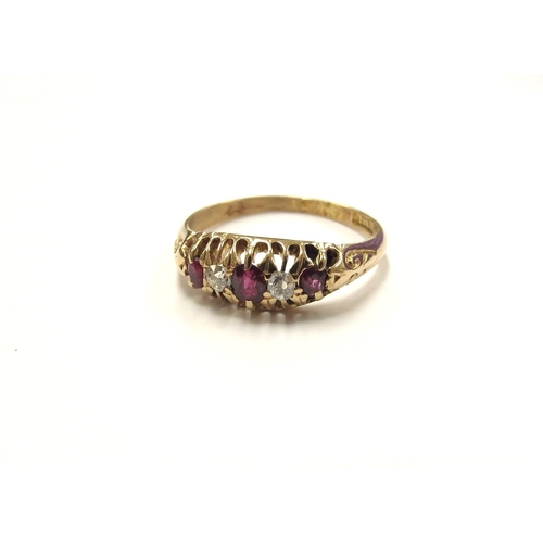 6388 - An 18ct gold ruby and diamond ring. size N/O, 2.7g