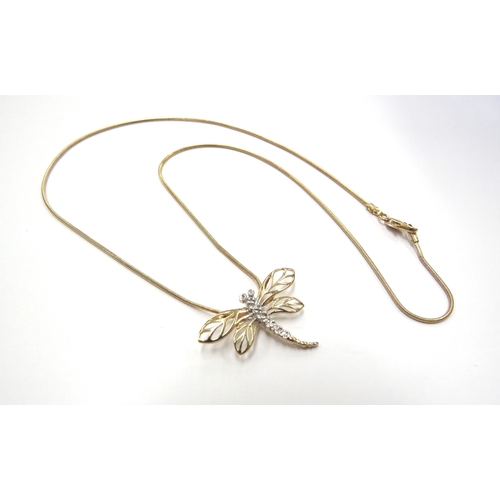 6367 - A 9ct gold chain hung with a diamond set dragonfly pendant, 40cm long, 3.8g