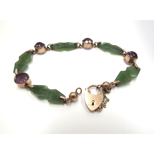 6081 - An amethyst and nephrite bracelet with gold padlock clasp stamped 9ct, 21cm long