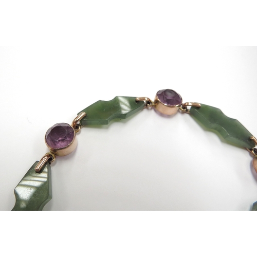 6081 - An amethyst and nephrite bracelet with gold padlock clasp stamped 9ct, 21cm long