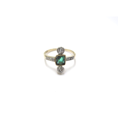 6298 - A diamond and green stone ring, the square centre stone set with a diamond to top and bottom with di... 