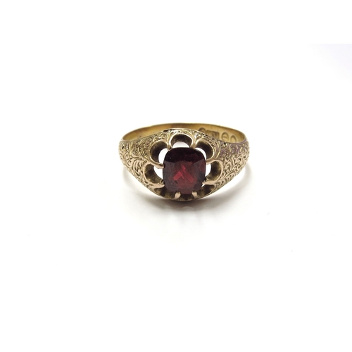 6383 - A 15ct gold engraved ring with single garnet in open claw mount. Circa 1880's. Size R, 4.1g