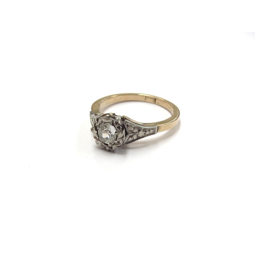 6307 - A diamond solitaire ring with ornate shoulders, stamped 18ct. Size M/N, 2.5g