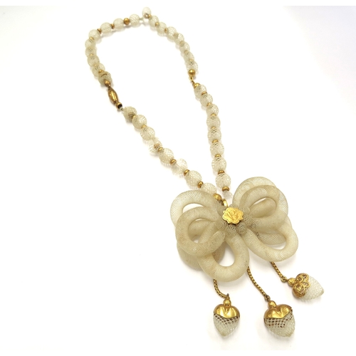 6418 - A Victorian woven hair bead necklace with woven triple bow hung with three heart shape drops, unmark... 