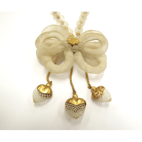 6418 - A Victorian woven hair bead necklace with woven triple bow hung with three heart shape drops, unmark... 