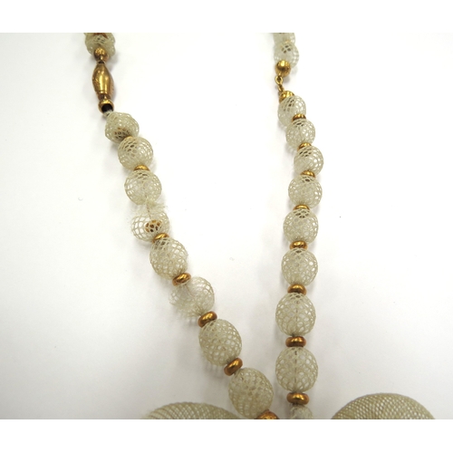 6418 - A Victorian woven hair bead necklace with woven triple bow hung with three heart shape drops, unmark... 