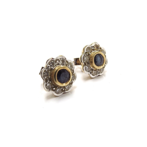 6014 - A pair of 18ct gold sapphire and diamond cluster stud earrings, 4.3g