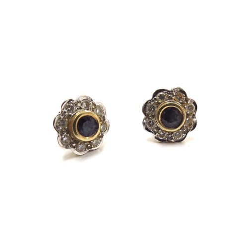 6014 - A pair of 18ct gold sapphire and diamond cluster stud earrings, 4.3g