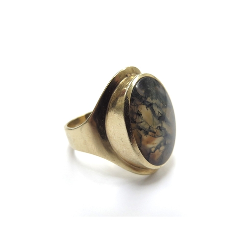 6028 - A 9ct gold ring with a large oval moss agate. Size R/S, 8g