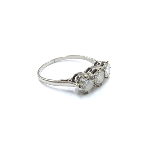 6135 - A platinum three stone diamond ring 1.80ct total approx. Size R, 3.7g