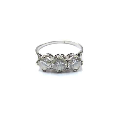 6135 - A platinum three stone diamond ring 1.80ct total approx. Size R, 3.7g