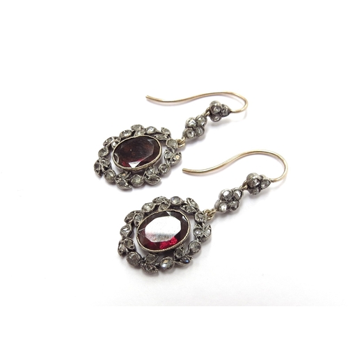 6004 - A pair of Edwardian old cut diamond and garnet drop earrings, 3.5cm drop, 3.2g