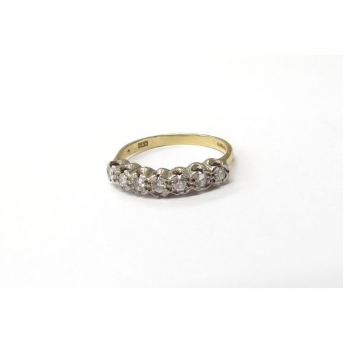 6275 - An 18ct gold seven stone diamond half hoop ring. Size N/O, 3.1g