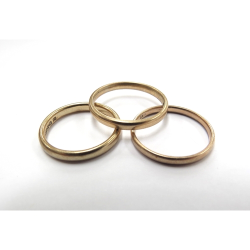 6078 - Three 9ct gold bands, sizes M,O and Q, 6g