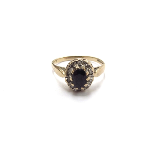 6308 - A 9ct gold sapphire and diamond ring. Size L, 2g